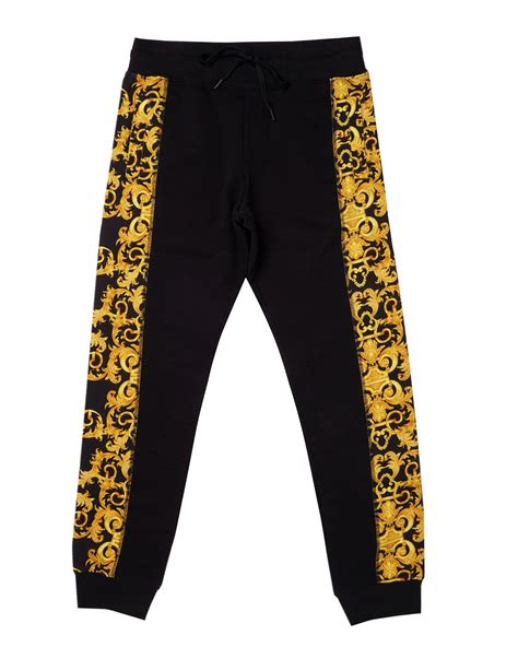 black and gold versace jeans|Versace black jeans men's.